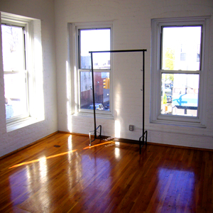 bedroom in loft apartment in park slope brooklyn on 5th ave. with wood floors and tin ceiling 11215 for rent