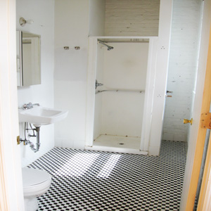 ceramic tile bathroom in the loft on the third floor of the hutwelker building in park slope brooklyn